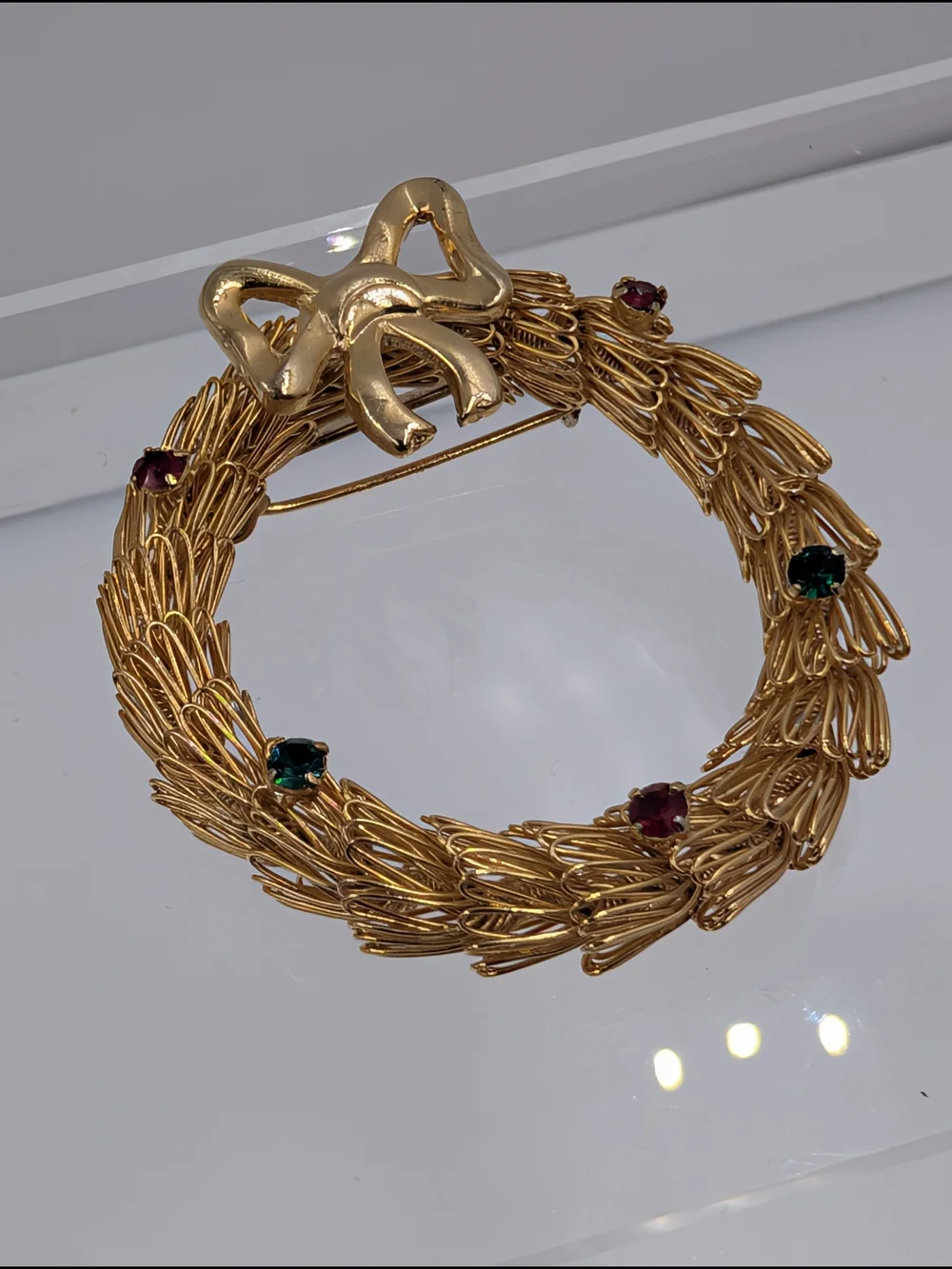 Gold-Tone Wreath Brooch with Green and Red Stones C66